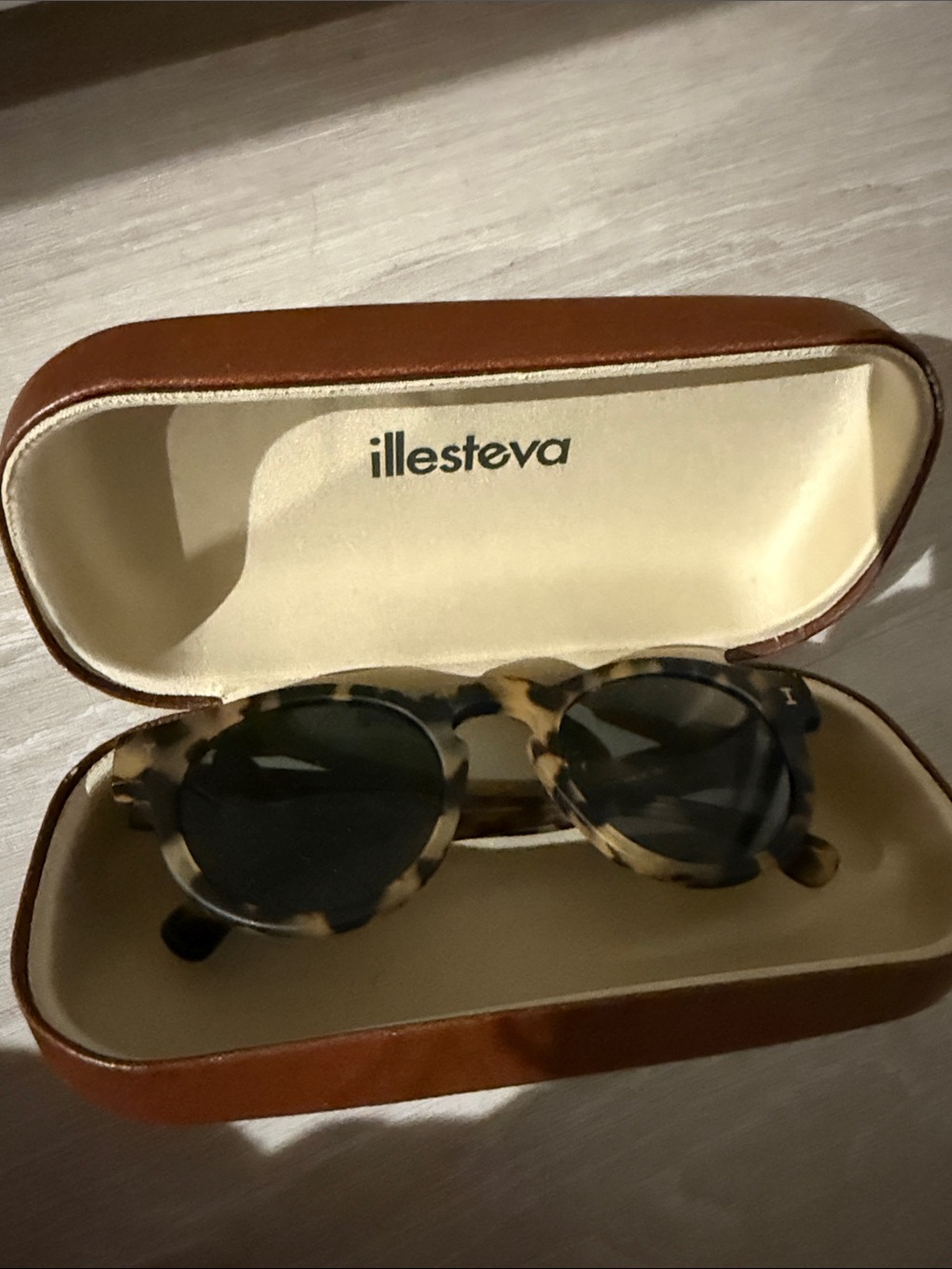Illesteva Tortoise Round Sunglasses with Dark Lenses